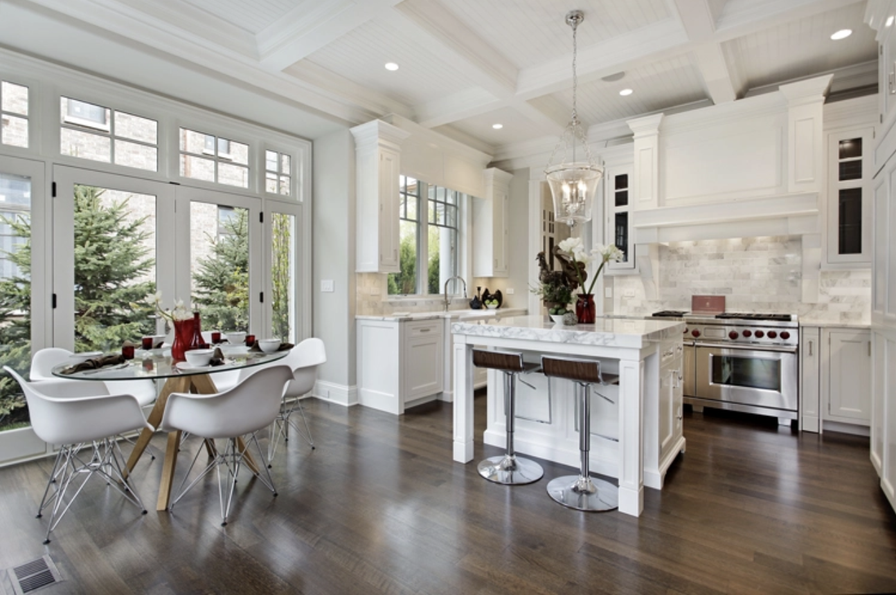 neutral kitchen interior with dark wood floors